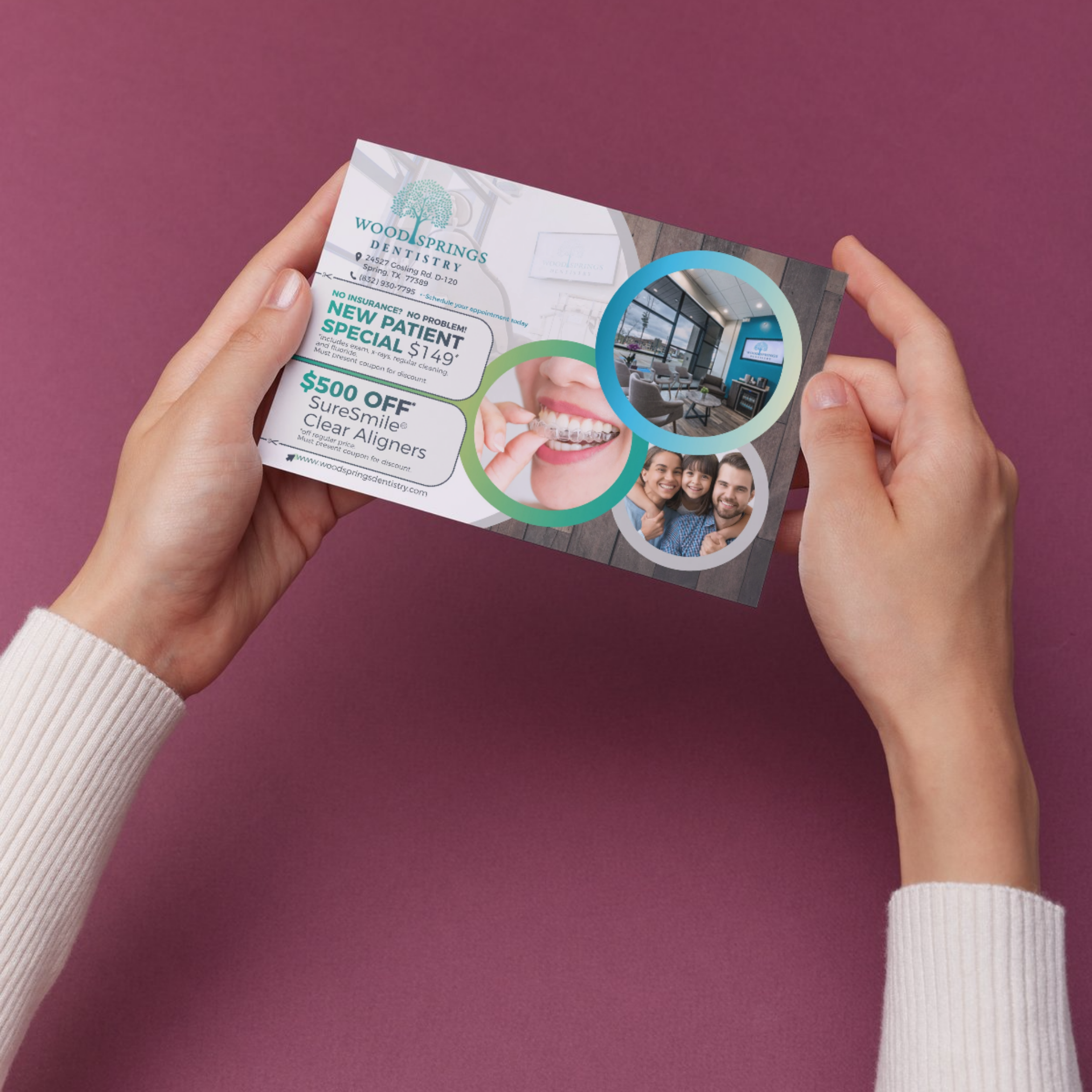 person holding advertising postcard from dental office